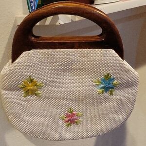 Elegant Cream Handbag with Floral Accents